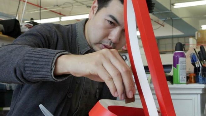 Pachara Kangchirdsri, a third-year master of industrial design student at Pratt Institute, works on his design Jeté.