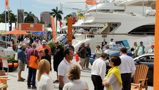 Organizers reported a 17 percent increase in attendance at this year’s Palm Beach International Boat Show, where luxury yacht brokerage company Worth Avenue Yachts, above, exhibited.