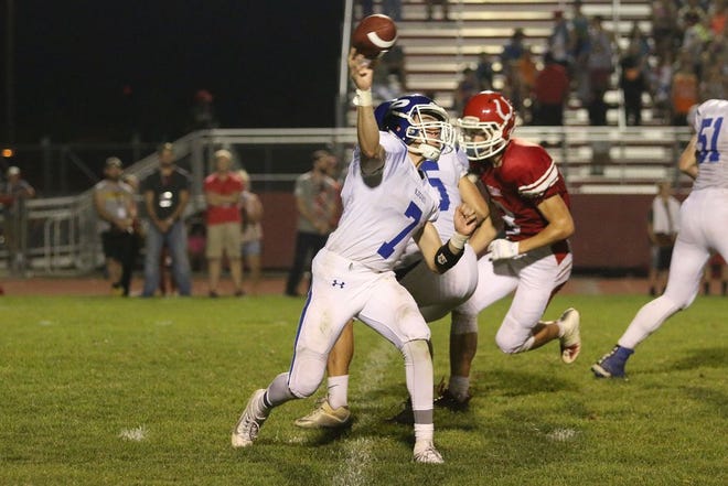 Perry quarterback Alexis Garrido throws a pass in the fourth quarter against DC-G on Sept. 24. The Blue Jays lost 31-0 to the Mustangs.