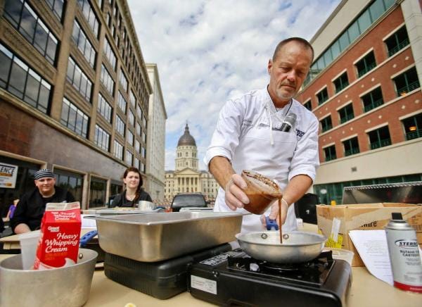 Chef Scott Nickel prepares the Brickyard Barn's Valentines Day Chocolate Omelet during the Chocolate Festival in downtown Topeka, Saturday morning.