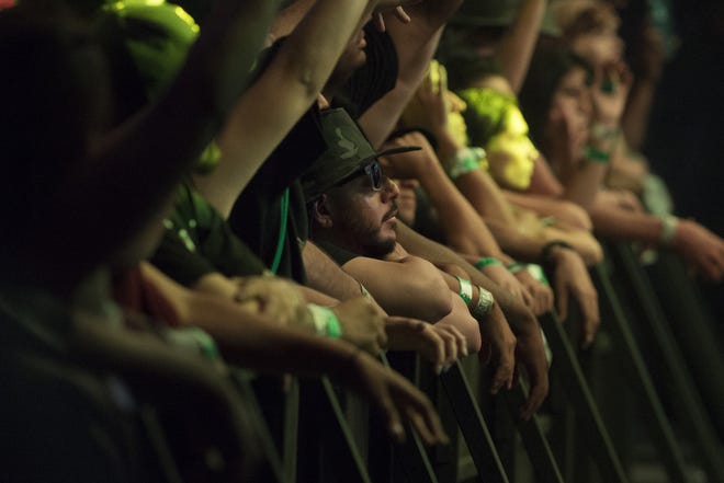 Fans front and center lean on the barricade during Sk8 Maloley's set at the High Life Music Festival at the High Desert Event Center on Saturday in Victorville.

Jose Huerta, Press Dispatch