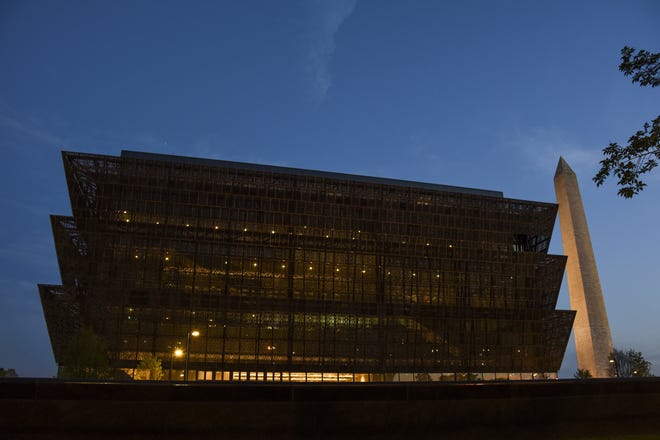 The new National Museum of African American History and Culture just after sunset. The museum opened to the public Saturday. 



The Washington Post/Jahi Chikwendiu