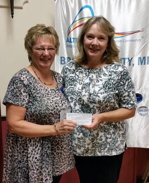 Altrusa International of Branch County shows their support for the Literacy Council of Branch County with a donation of $1,500.The money will be used to supply training and materials for volunteer tutors. Courtesy Photo