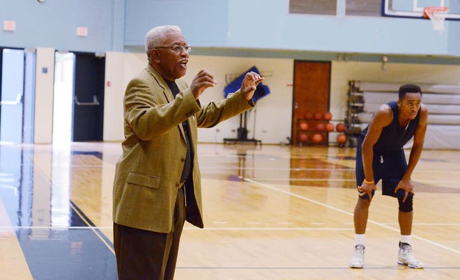 Former Lenoir Community College basketball coach Bobby Dawson runs a practice on Nov. 11, 2014, inside the gym which is named in his honor.