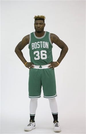 Boston Celtics guard Marcus Smart, posing for a photograph during media day at the team's training facility in Waltham Wednesday, wants to be an impact player this season. AP PHOTO/STEVEN SENNE