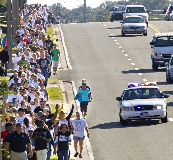 Between 400-500 people took part in the fourt annual God Belongs in My City Walk last year. This year's event steps off Saturday morning. (Doug Engle/Ocala Star-Banner)2015.