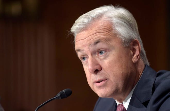 Wells Fargo Chief Executive Officer John Stumpf testifies on Capitol Hill in Washington, Tuesday, Sept. 20, 2016, before Senate Banking Committee. Stumpf was called before the committee for betraying customers' trust in a scandal over allegations that employees opened millions of unauthorized accounts to meet aggressive sales targets. (AP Photo/Susan Walsh)