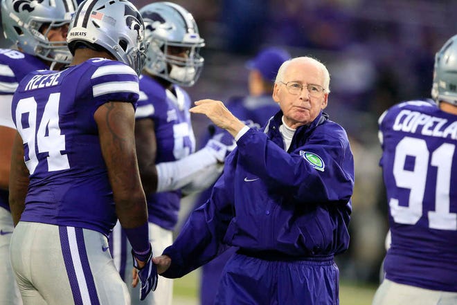 Kansas State head coach Bill Snyder pats the shoulder of defensive end C.J. Reese (94) before an NCAA college football game against Missouri State in Manhattan, Kan., Saturday, Sept. 24, 2016.