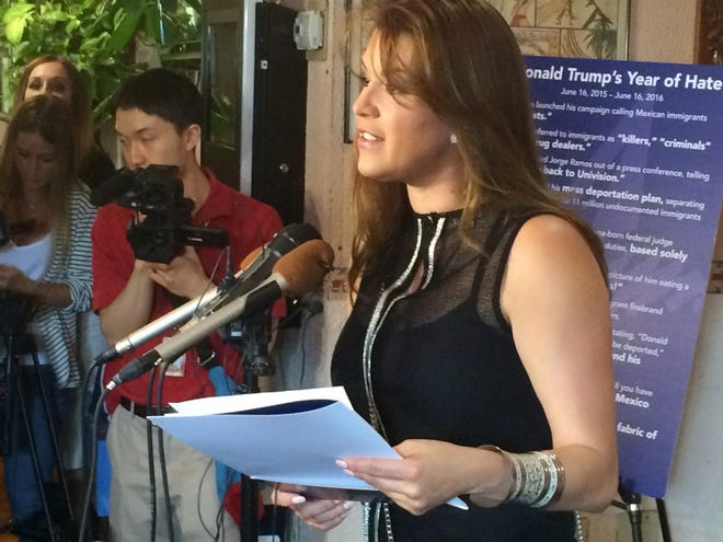 In this June 15, 2016, file photo, former Miss Universe Alicia Machado speaks during a news conference at a Latino restaurant in Arlington, Va., to criticize Republican presidential candidate Donald Trump. Machado became a topic of conversation during the first presidential debate between Trump and Democratic candidate Hillary Clinton on Monday. (AP Photo/Luis Alonso Lugo, File)