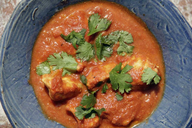 This September 2016 photo shows chicken tikka masala in New York. This dish is from a recipe by Melissa d'Arabian. (Melissa d'Arabian via AP)