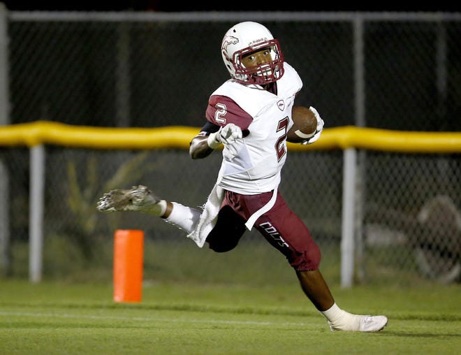 North Marion Colts receiver Josh Brown scores a touchdown against the Gainesville Hurricanes on Friday, Sept. 23, 2016 in Gainesville, FL. Gainesville defeated North Marion 22-21. Matt Stamey/Gainesville Sun
