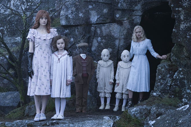 In this image released by 20th Century Fox, from left, Lauren McCrostie, Pixie Davies, Cameron King, Thomas and Joseph Odwell and Ella Purnell appear in a scene from "Miss Peregrine's Home for Peculiar Children."

JAY MAIDMENT / 20TH CENTURY FOX VIA AP