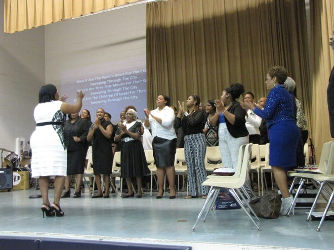 The Reunion Choir, under the direction of First Lady Sylvia Armstrong, front, was formed especially for the 2016 Reunion Weekend at New Beginnings Church of God in Christ. Photos by Aida Mallard/Special to the Guardian