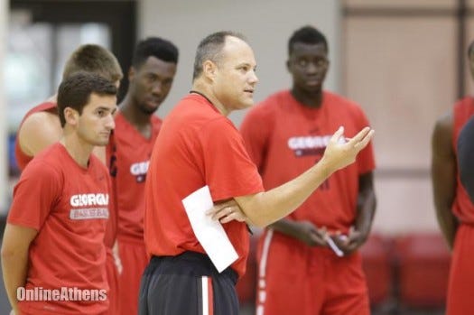 Head Coach Mark Fox speaks with players during practice at the the University of Georgia's Stegeman Training Facility, Thursday, July 28, 2016, in preparation for the Bulldog's trip to Spain. They depart from Athens Sunday July 31, to play in Madrid, Valencia, and Barcelona. (Photo/ John Roark, Athens Banner-Herald)