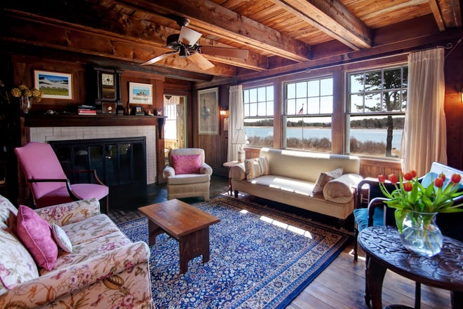 The living room at 74 South Road on Wings Neck in Pocasset. The home remains much the same as it did 100 years ago. Lauren Clough photos (aerial shot on cover by Tyra Pacheco)