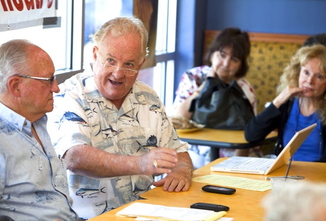 Buddy Martin, second from the left, speaks during the meeting to save the Marion Theater at Panera Bread in Ocala on April 19, 2011. His local radio show, "The Voice of Ocala with Buddy Martin," goes off the air after Friday's broadcast. (Alan Youngblood/Star-Banner file photo)
