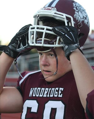 Woodridge High School lineman Carson Everly returned to action at Lahoski Field earlier this month, in Akron, Ohio, after being cleared to play his first game since suffering his second football-related concussion since August. (Phil Masturzo/Akron Beacon Journal/TNS)