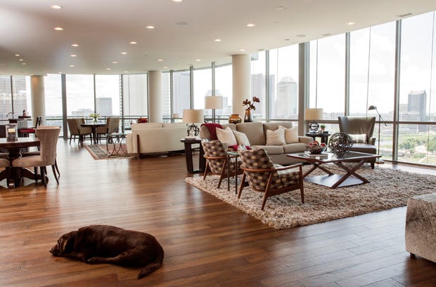Former Upper Arlington residents enjoy scenic vistas from their 4,400-square-foot condominium on the 18th floor of the Condominiums of North Bank. Furnishings and finishing touches were done in collaboration with Cary Gerschutz, an interior designer with Darrons Contemporary Furniture.