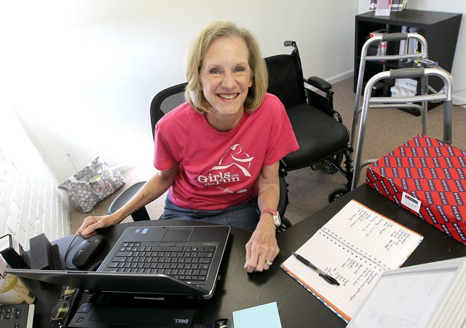 Girls on the Run Executive Director Kathleen Boyce started back to work full time in August after suffering an abdominal aortic aneurysm that almost killed her in February. JOHN CLARK/THE GAZETTE