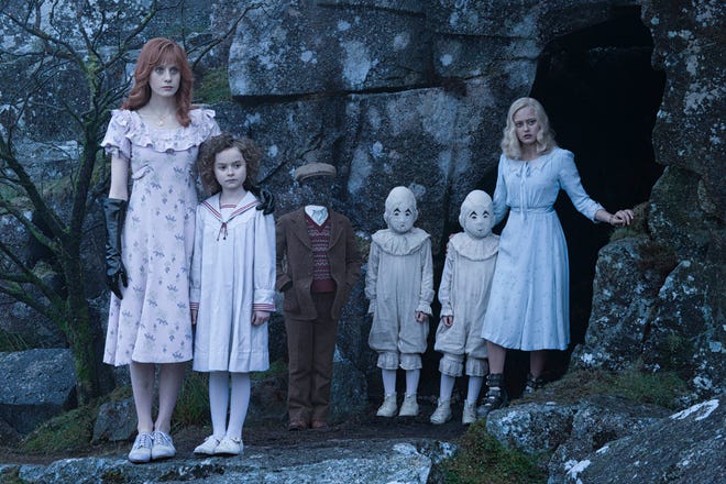 From left to right: Lauren McCrostie, Pixie Davies, Cameron King, Thomas and Joseph Odwell and Ella Purnell appear in a scene from, "Miss Peregrine's Home for Peculiar Children." (20th Century Fox)