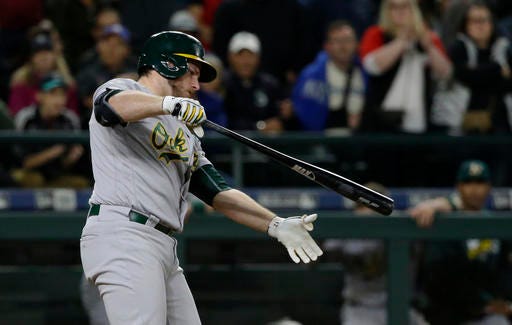 Oakland Athletics' Max Muncy reacts after he struck out swinging to end the team's baseball game against the Seattle Mariners, Thursday, Sept. 29, 2016, in Seattle. The Mariners won 3-2. (AP Photo/Ted S. Warren)