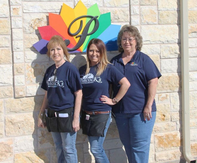 To promote Breast Cancer Awareness Month, Peacock's is offering a free meal to women who have a mammogram and bring in their receipt. The offer is open through the end of October. Pictured are Peacock's employees Linn Whitely, Amber Gordon and manager Judy Bissonnette.