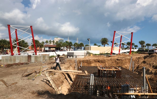 Construction is well underway on two new thrill rides on State Road A1A just south of Main Street in Daytona Beach. One will be a 380-foot-tall slingshot while the other will be a 200-foot-tall ride called the Vomatron. The rides are expected to be ready in time for Bike Week next year. News-Journal/JIM TILLER
