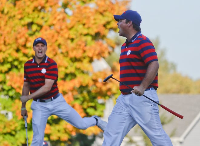 United States’ Patrick Reed celebrates his birdie on the 14th hole with United States’ Jordan Spieth during a four-ball match at the Ryder Cup golf tournament Saturday, Oct. 1, 2016, at Hazeltine National Golf Club in Chaska, Minn. (AP Photo/Chris Carlson)