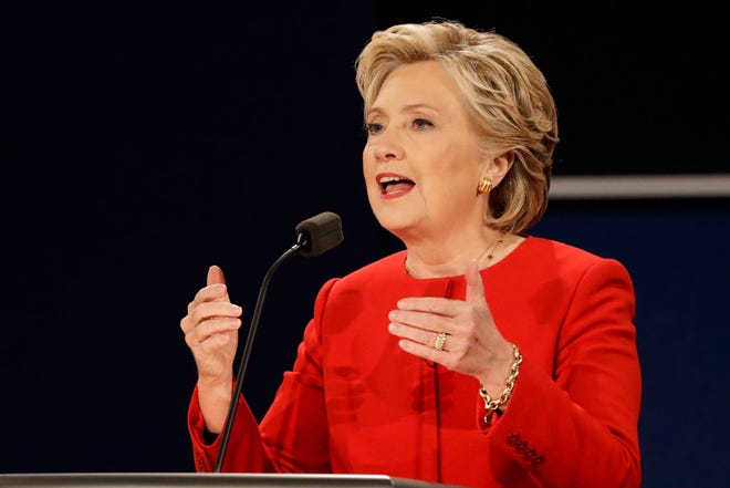 Democratic presidential nominee Hillary Clinton gestures while answering a question at the first presidential debate on Sept. 26, 2016.