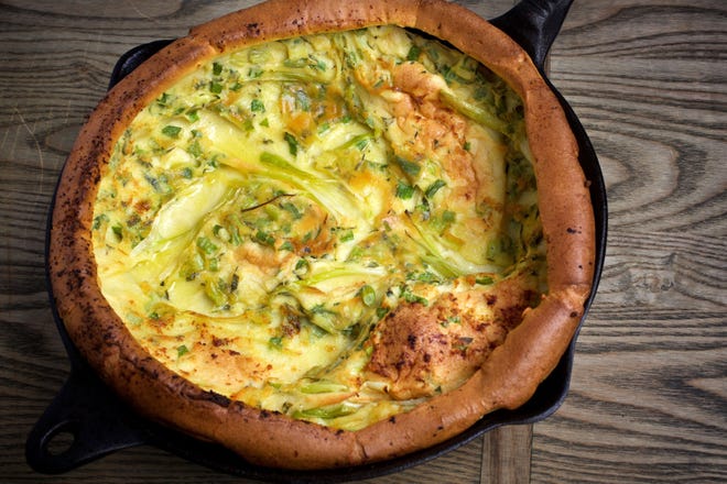Dorie Greenspan’s Herb and Scallion Dutch Baby is a savory take on what is typically a sweet breakfast or dessert.