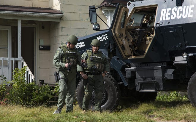 The Rockford police SWAT team participates in a training exercise Tuesday, Oct. 4, 2016, in the 500 block of Foster Avenue. The three-day training is meant to make sure team members are comfortable using all the tools and tactics necessary for high-risk warrant service. KAYLI PLOTNER/STAFF PHOTOGRAPHER/RRSTAR.COM