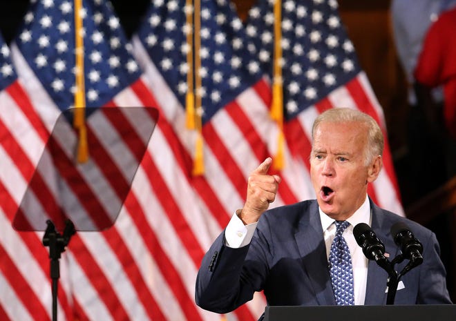 Vice President Joe Biden rallies supporters for Hillary Clinton in Florida on Monday. At a rally in Sarasota on Monday night, Biden blasted Trump’s comments on veterans and post-traumatic stress disorder. JOE BURBANK/Orlando Sentinel via AP