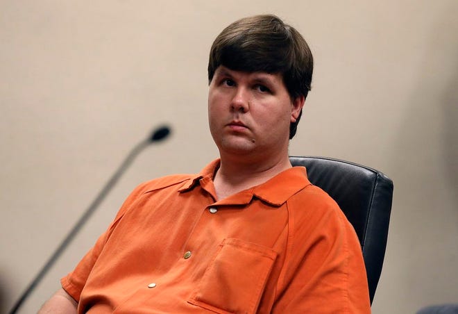 Justin Ross Harris, who prosecutors said intentionally left his 22-month-old son strapped inside a hot car to die because he wanted to live a child-free life, sits in Cobb County Magistrate Court in Marietta, Georgia, U.S. on July 3, 2014. REUTERS/Kelly Huff /Pool