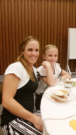 Kristi Moeller and her daughter, 8-year-old McKenzie who attended Women's Conference for the first time. SPECIAL TO THE LOG