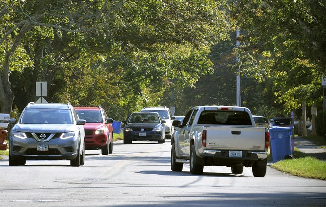 Vehicles travel recently on Forest Avenue in Middletown, where town officials are considering vehicle weight limits to reduce traffic and improve safety.