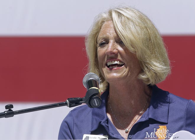 In this Aug. 17, 2016, file photo, Illinois state Comptroller Leslie Munger speaks to supporters during Governor's Day at the Illinois State Fair. (AP Photo/Seth Perlman, File)