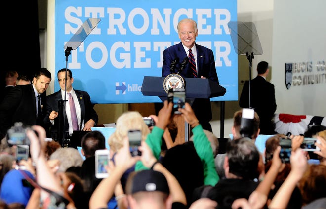 Vice President Joe Biden takes center stage as he campaigns for Hillary Clinton at the Lower Bucks campus of Bucks County Community College in Bristol Township on Friday Oct. 7, 2016.