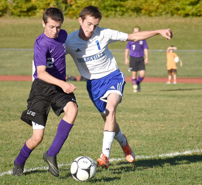 Little Falls Mountie Ryan Feane and Dolgeville Blue Devil Andrew Mosenthin (from left) compete for the ball near the sideline during the first half of Wednesday’s match.   

Times Telegram Photo/Jon Rathbun