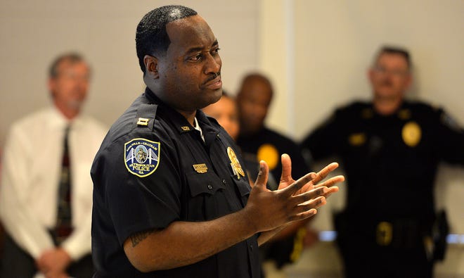 Capt. Devonn Adams speaks to concerned residents in the Islands Precinct during a community meeting to discuss the increase in crime on the islands. (Josh Galemore/Savannah Morning News)