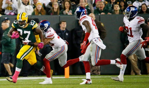 Green Bay Packers' Eddie Lacy runs during the first half of an NFL football game against the New York Giants Sunday, Oct. 9, 2016, in Green Bay, Wis. (AP Photo/Mike Roemer)