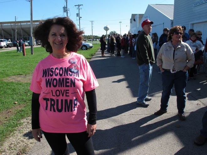 Donald Trump supporter Jean Stanley says she is standing by the Republican presidential nominee despite lewd comments caught on tape that led to him being uninvited from a GOP unity rally on Saturday, Oct. 8, 2016, in Elkhorn, Wis. (AP Photo/Scott Bauer) ORG XMIT: RPSB101