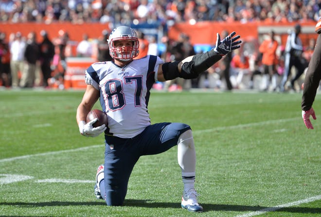 Rob Gronkowski signals a first down during the second half on Sunday.