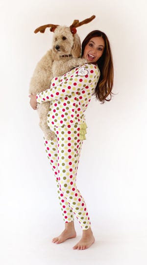 Lauren Raja, with help of a friend, models a pair of polka dot pajamas