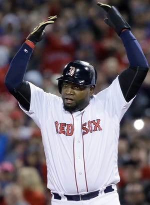David Ortiz encourages the crowd after drawing a walk in his final at bat during the eighth inning in Game 3 of the ALDS. AP Photo/Elise Amendola