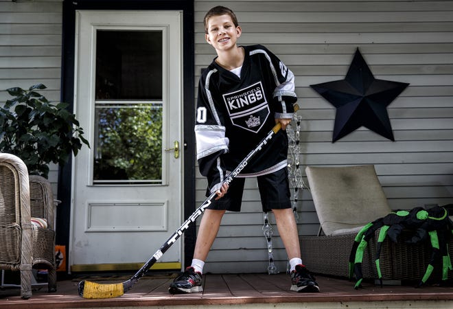 Andrew Reimers, 12, a forward for the Springfield Youth Hockey Association's Springfield Kings team, will be representing the group in the Chicago Blackhawks pre-game ceremony for their season opener in Chicago. Justin L. Fowler/The State Journal-Register