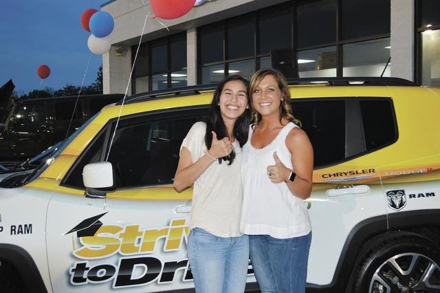 Spring 2016 Strive to Drive contest winner Alejandra Conyer, 18, poses with Strive to Drive Director Brittany Sloan. Conyer took home a 2016 Jeep Renegade.