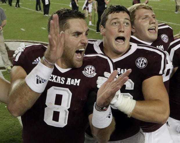 Trevor Knight leads a Texas A&M celebration after the Aggies' double-overtime victory over Tennessee last Saturday. (AP Photo)