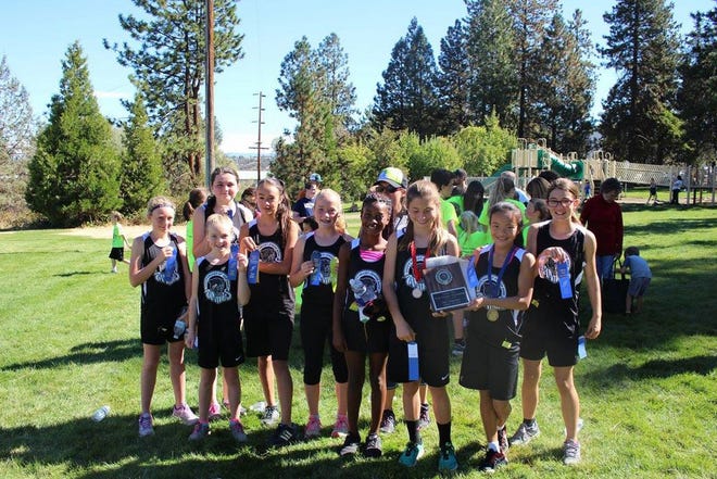 The Scott Valley Junior High School girls cross country team, above, took first place in the middle school girls race at the Yreka Elks Cross Country Invite on Saturday.                     Photo courtesy of Pam Borg