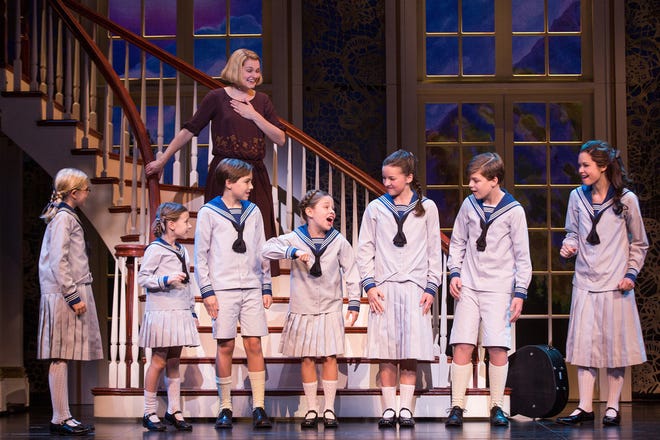 Maria (Kerstin Anderson) teaches the von Trapp children to sing "Do-Re-Mi" in this scene from "The Sound of Music." [Photo by Matthew Murphy]