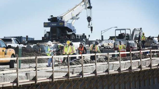 Construction has resumed on the Flagler Memorial Bridge after a brief interruption for Hurricane Matthew.